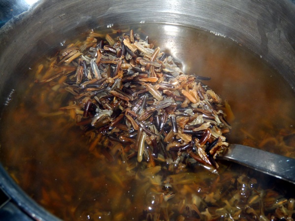 Cook wild rice according to package directions and drain