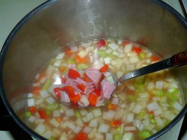Add veggies, ham and beans and simmer for 20 minutes.