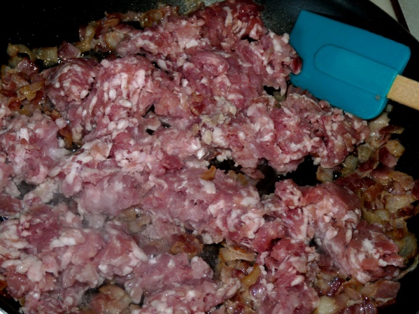 Add ground pork and fry until it is browned