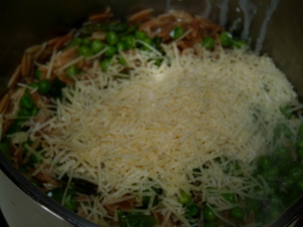 Drain, then stir in cream and Parmesan