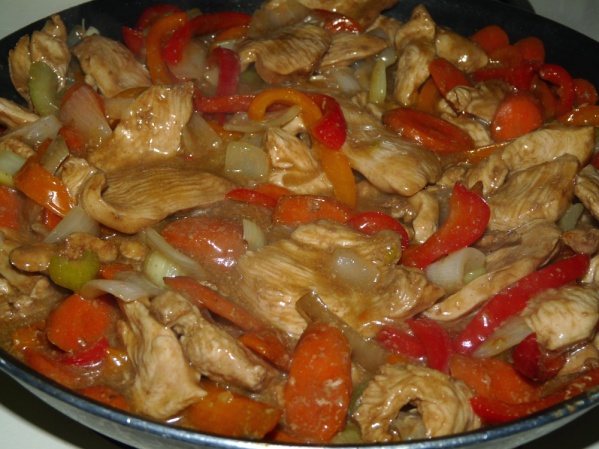 Thicken sauce and add chicken and veggies back to coat