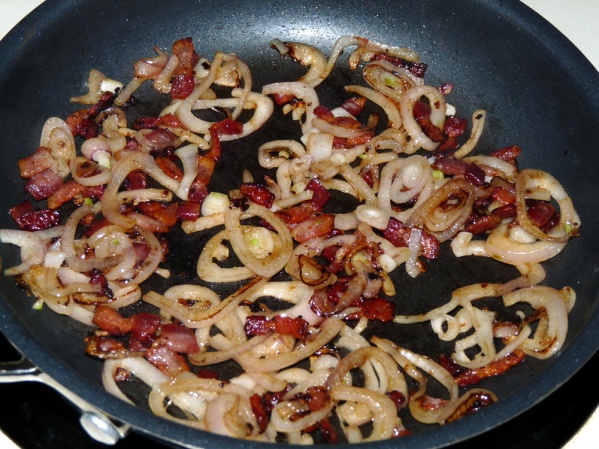 Fry bacon until browned and crispy. Add shallots or onions the last few minutes