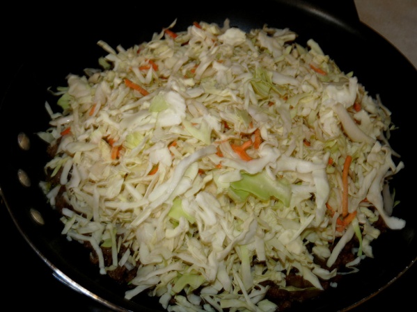 Add bag of coleslaw and stir well