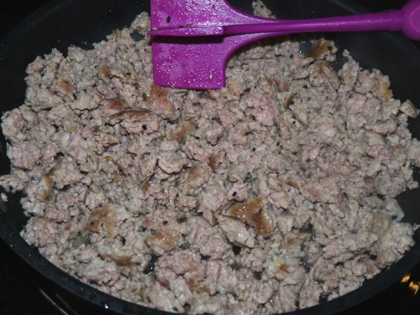 Brown sausage until browned in places. Cut into small pieces