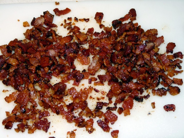 Dice bacon and fry until browned and crispy. Drain on paper toweling.