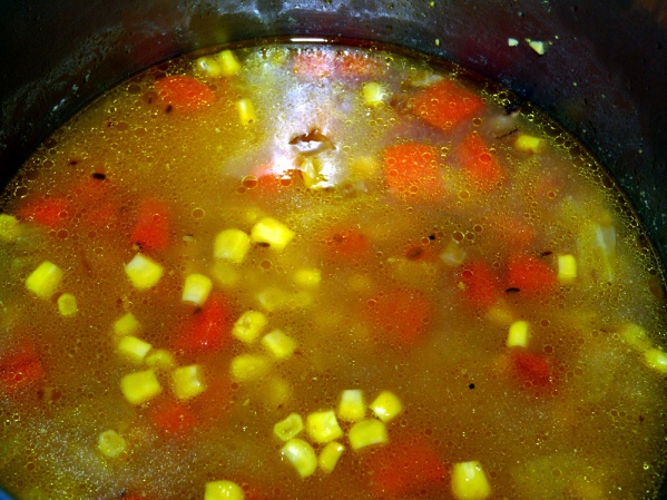 Add corn and bring to a boil again over medium high heat. Reduce to medium low and simmer another 15 minutes.