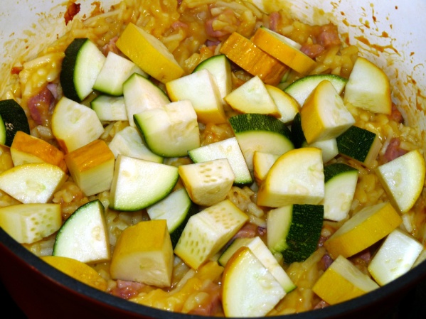 After one hour add diced zucchini and summer squash and stir well. Bake for 30 more minutes.