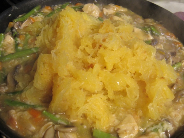 Stir in Parmesan until melted, then stir in spaghetti squash. Cook until heated through.