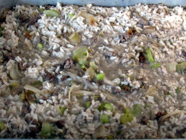 Spread mushroom soup mixture over rice and cover pan with foil. Bake for 30 minutes at 350°
